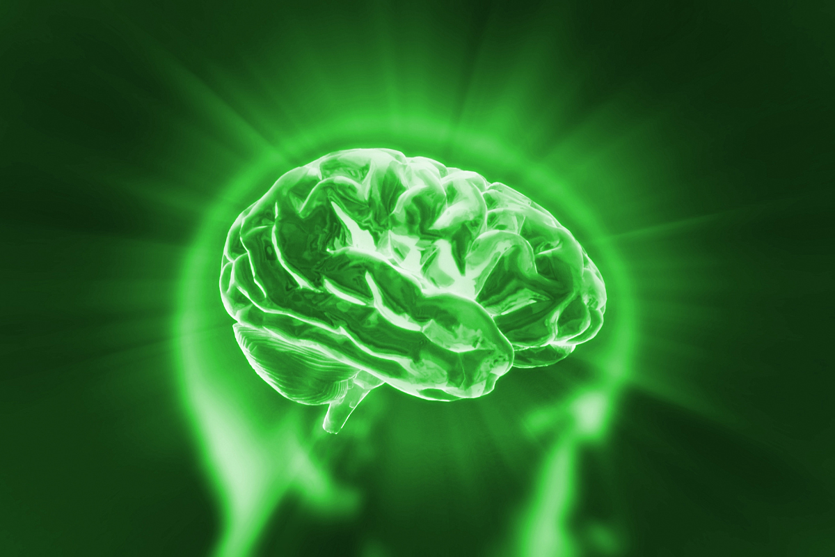 Illustration d’un cerveau lumineux vert, représentant les solutions pour améliorer la santé mentale avec des nootropiques
